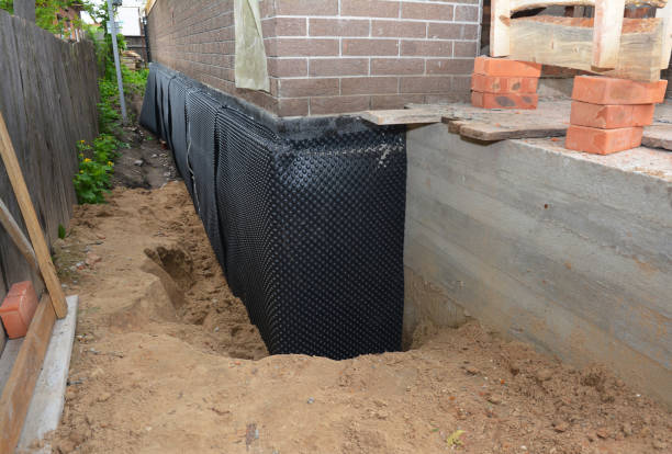 Happy homeowners after waterproofing job in Lawrenceburg